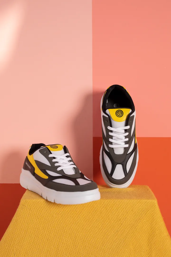 E-commerce: Sneakers on coral. Product image, retouching by Mohammed Yasin.