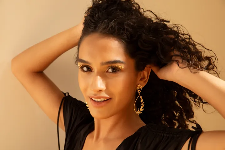 Curls in amber. Beauty & jewellery image, retouching by Mohammed Yasin.