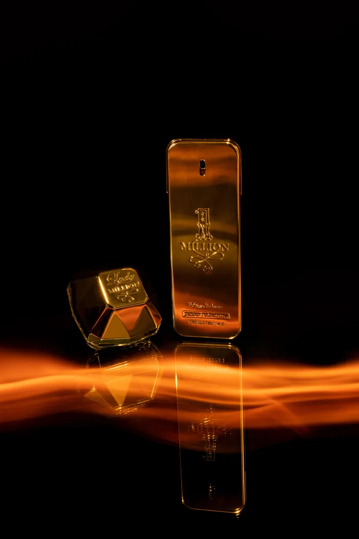 Fragrance still life: Gold and fire. Product image, retouching by Mohammed Yasin.